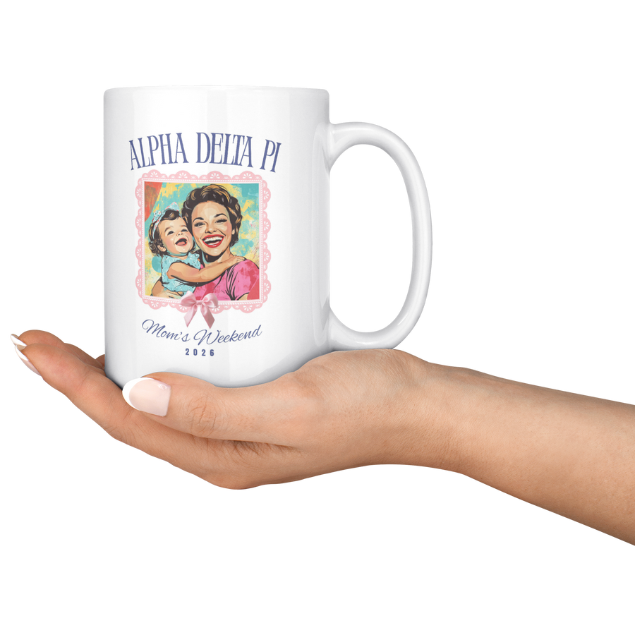 Alpha_Delta_Pi_Moms_Wkd_Mug_15ozWhiteMugLifestyleRHServing_Mockup.png_15422529
