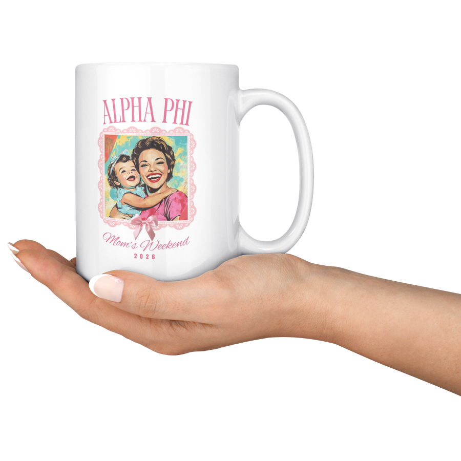 Alpha_Phi_Moms_Wkd_Mug_15ozWhiteMugLifestyleRHServing_Mockup.png_15422620
