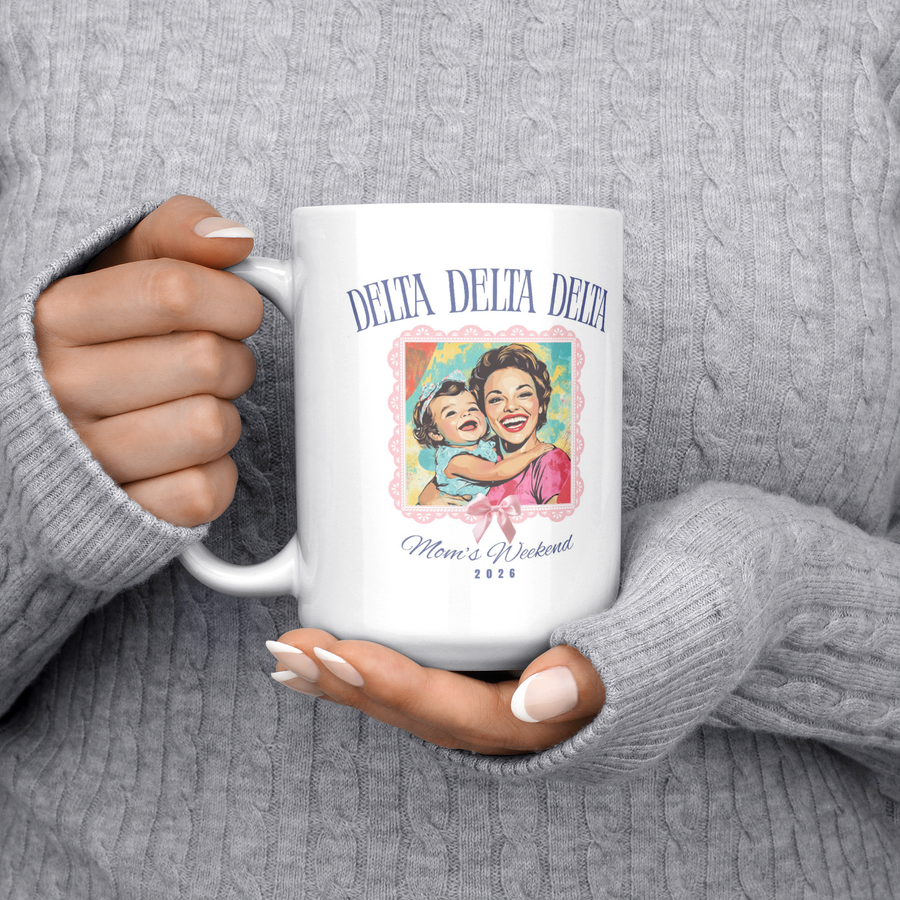 Delta_Delta_Delta_Moms_Wkd_Mug_15ozWhiteMugLifestyleLHChest_Mockup.png_15422506