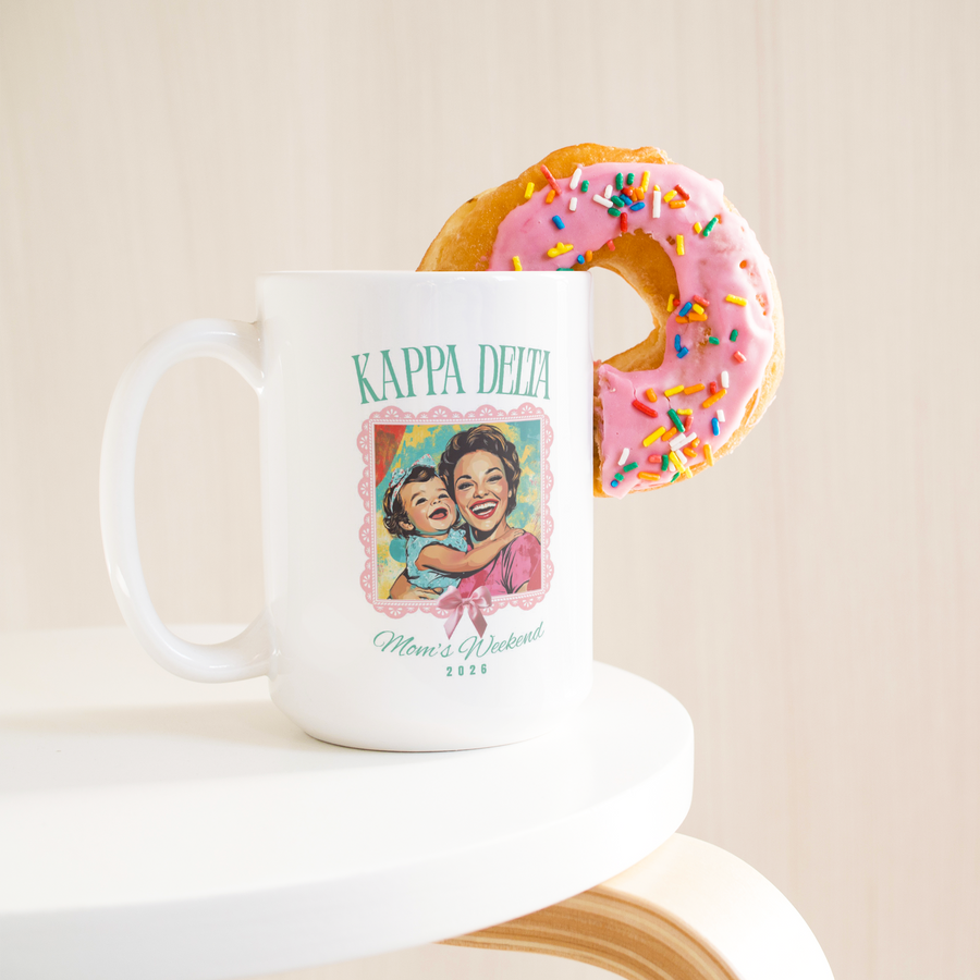 Kappa_Delta_Moms_Wkd_Mug_15ozWhiteMugLifetsyleDonutLH_Mockup.png_15422741