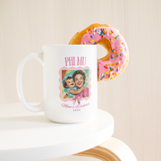 Phi_Mu_Moms_Wkd_Mug_15ozWhiteMugLifetsyleDonutLH_Mockup.png_15422751