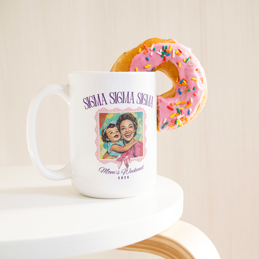 Sigma_Sigma_Sigma_Moms_Wkd_Mug_15ozWhiteMugLifetsyleDonutLH_Mockup.png_15422821