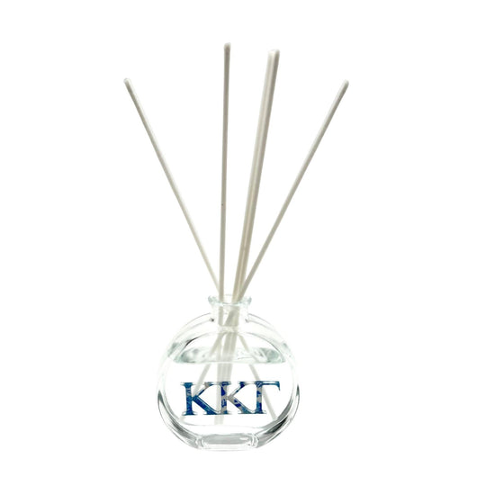 Reed diffuser with 'KKG' logo on a white background - traditional greek.